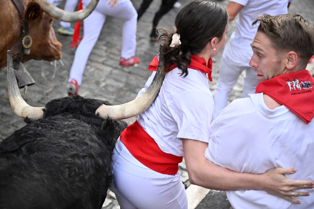 Dangerous moment during the Running of the Bulls in Pamplona